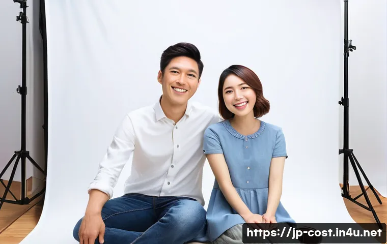 커플 사진 촬영비용 - A modern professional photography studio interior in Japan, featuring a diverse range of backdrops a...